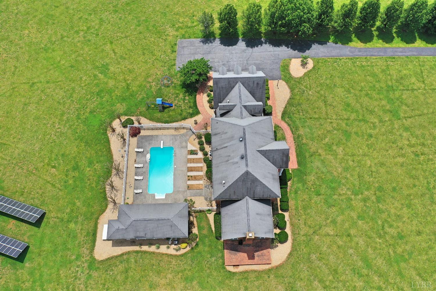 798 High Peak Road Monroe, VA 24574 - Photo 89 of 96 an aerial view of a house with outdoor space pool seating area and fire pit