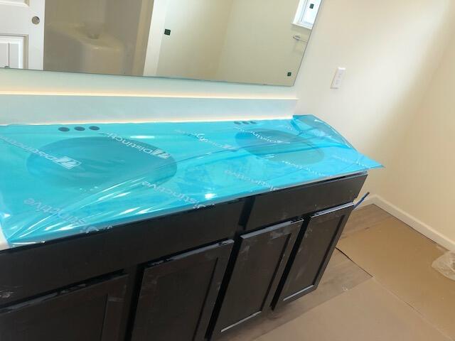 11 Thurber Road Ashville, OH 43103 - Photo 14 of 28 UP HALL BATH w/QUARTZ C-TOP & LVP FLOORING