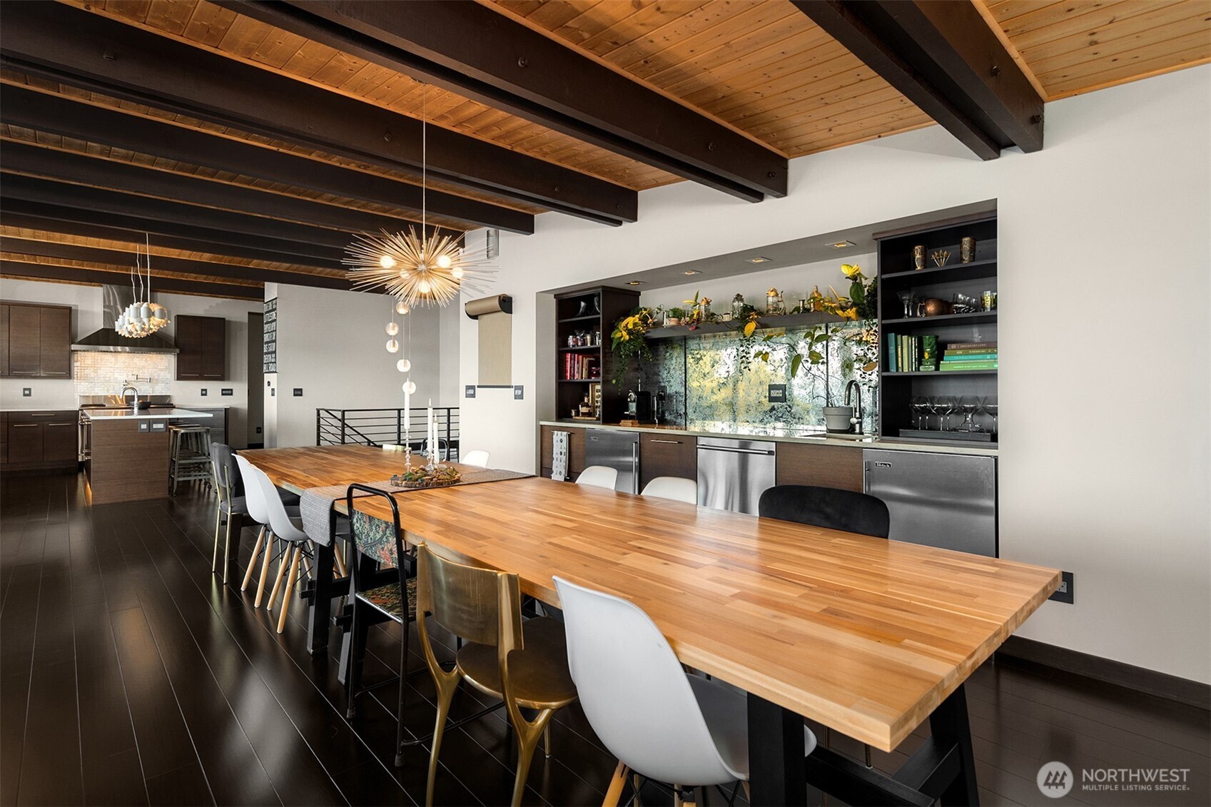 3831 58th Avenue Southwest Seattle, WA 98116 - Photo 16 of 40 a view of a dining table and chairs in a room