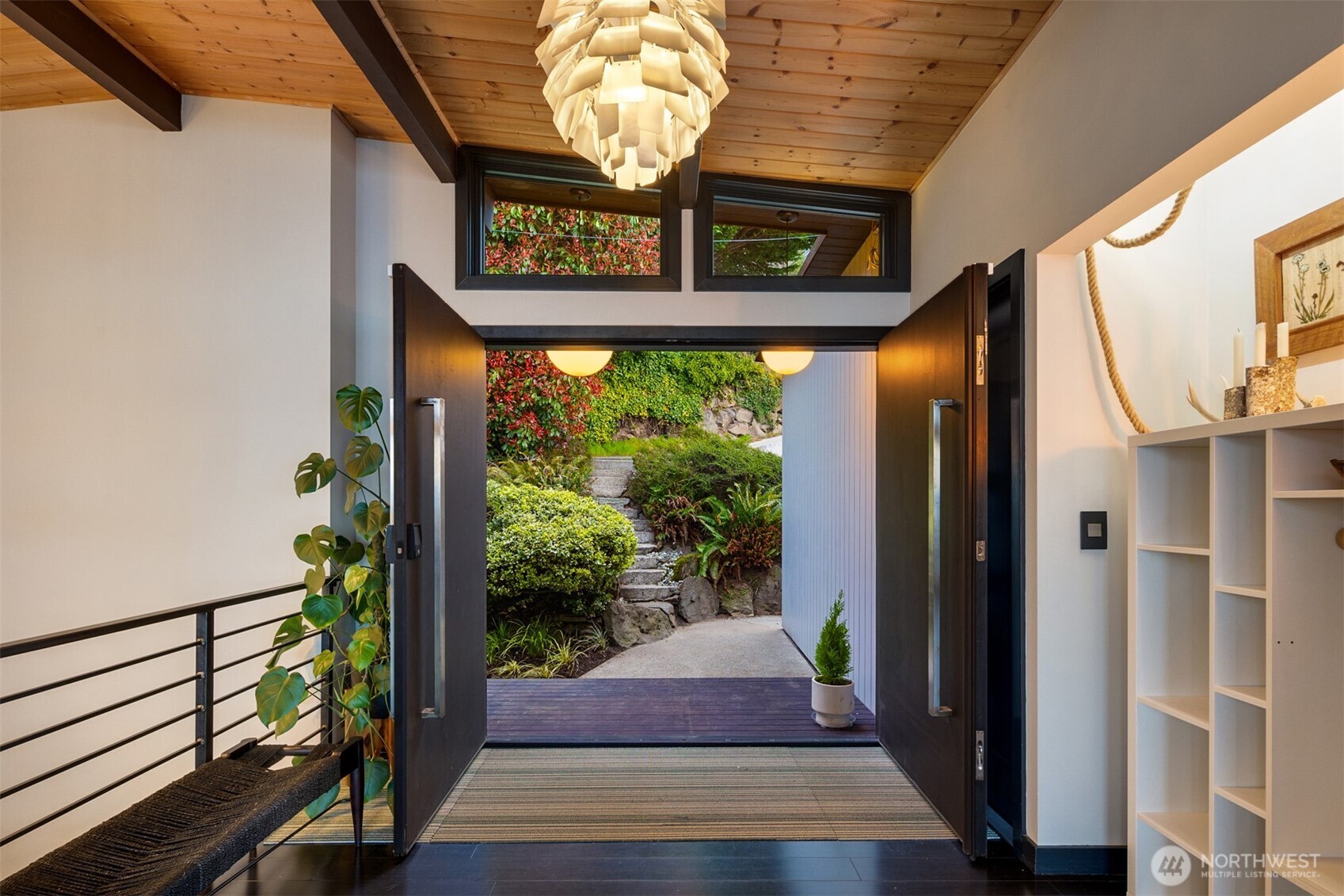 3831 58th Avenue Southwest Seattle, WA 98116 - Photo 17 of 40 a view of a street with sitting area