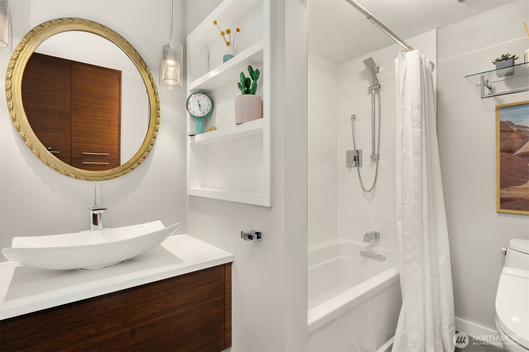 3831 58th Avenue Southwest Seattle, WA 98116 - Photo 36 of 40 a bathroom with a sink and a mirror