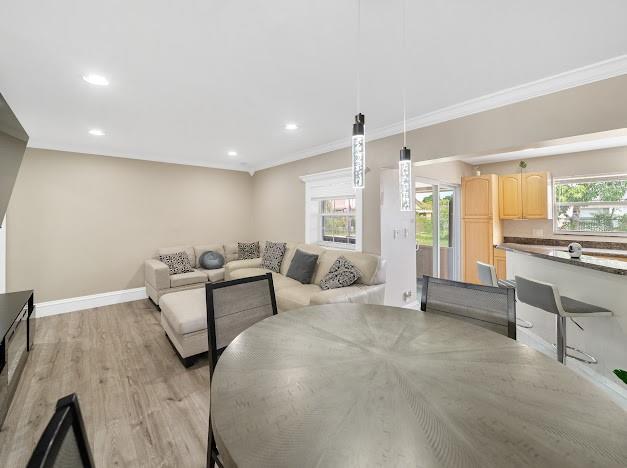 19426 Colorado Circle Boca Raton, FL 33434 - Photo 15 of 32 a living room with furniture and a large window