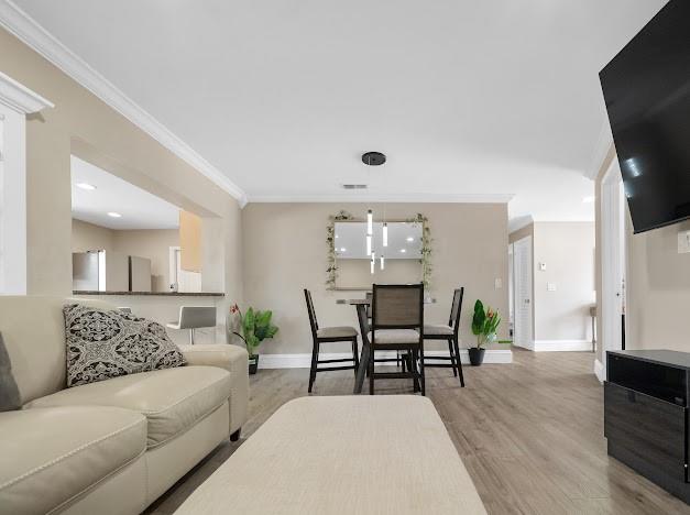 19426 Colorado Circle Boca Raton, FL 33434 - Photo 16 of 32 a living room with furniture and wooden floor