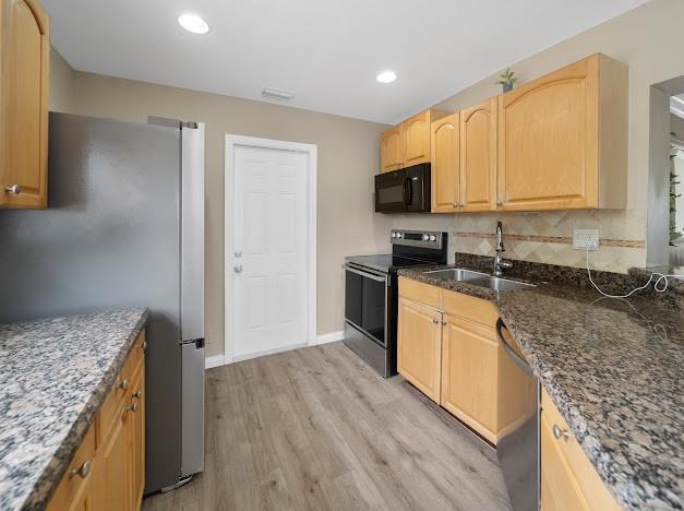 19426 Colorado Circle Boca Raton, FL 33434 - Photo 2 of 32 a kitchen with granite countertop a sink stove and refrigerator