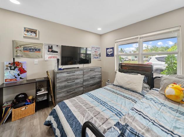 19426 Colorado Circle Boca Raton, FL 33434 - Photo 21 of 32 a bedroom with a bed and furniture