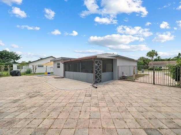 19426 Colorado Circle Boca Raton, FL 33434 - Photo 30 of 32 a front view of a house with a yard