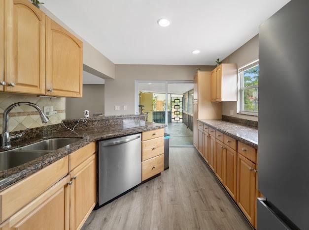 19426 Colorado Circle Boca Raton, FL 33434 - Photo 3 of 32 a kitchen with stainless steel appliances granite countertop wooden cabinets a sink and a stove