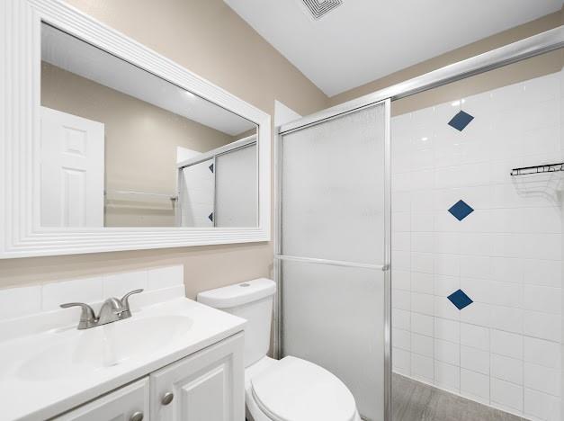 19426 Colorado Circle Boca Raton, FL 33434 - Photo 6 of 32 a bathroom with a sink a toilet and shower