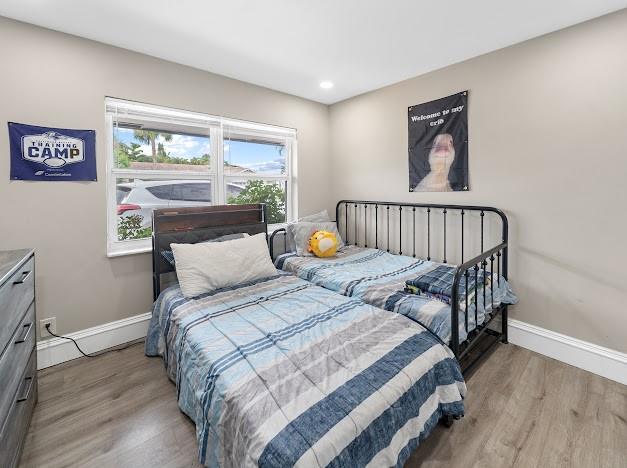 19426 Colorado Circle Boca Raton, FL 33434 - Photo 7 of 32 a bedroom with a bed and a window