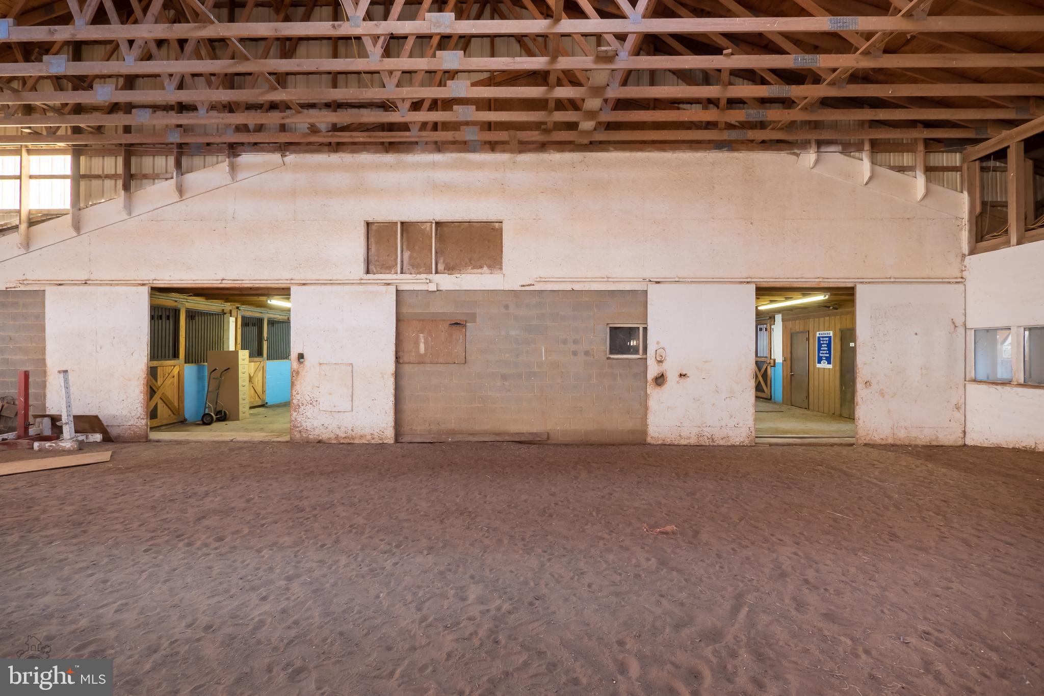 827 Pheasant Run Road Effort, PA 18330 - Photo 15 of 54 a view of a building with a garage