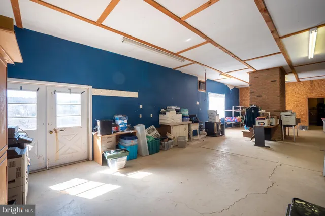 a room with furniture and a chandelier