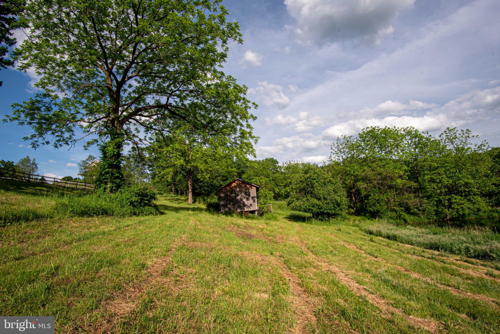 827 Pheasant Run Road Effort, PA 18330 - Photo 50 of 54 a view of a lake with a yard