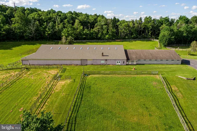 a view of a swimming pool and a yard