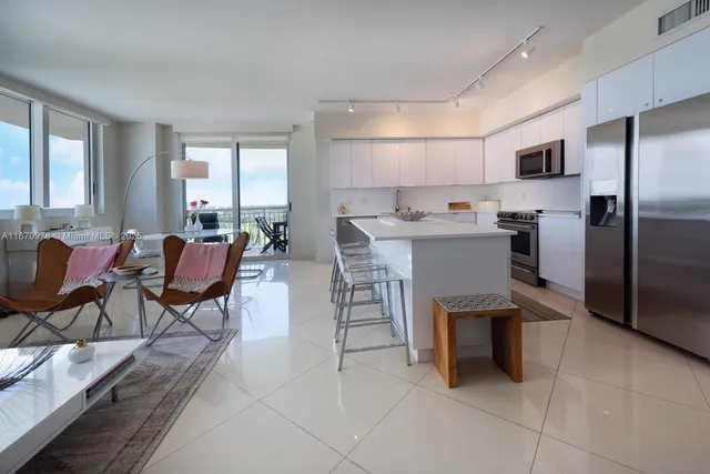 a view of a dining room kitchen and a window