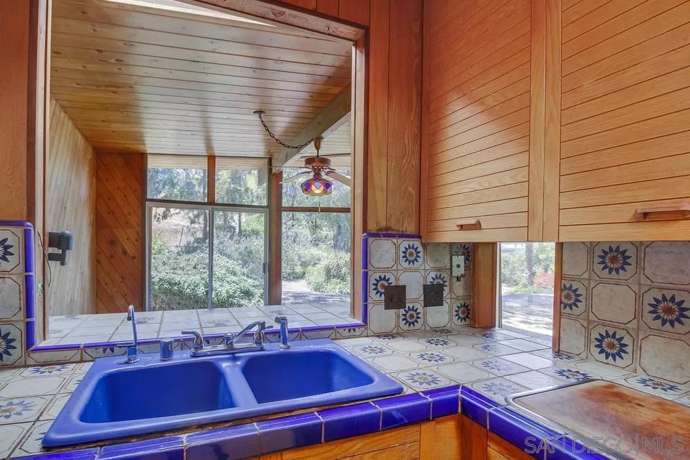 8680 Golf Drive Spring Valley, CA 91941 - Photo 23 of 70 a kitchen with a sink and a window