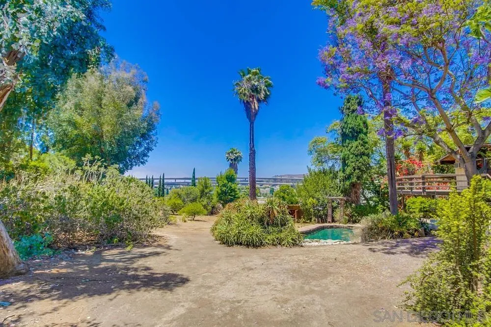 8680 Golf Drive Spring Valley, CA 91941 - Photo 27 of 70 a view of a garden with a house