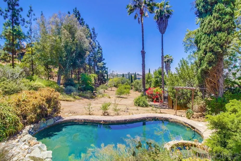8680 Golf Drive Spring Valley, CA 91941 - Photo 3 of 70 a view of a swimming pool with a yard