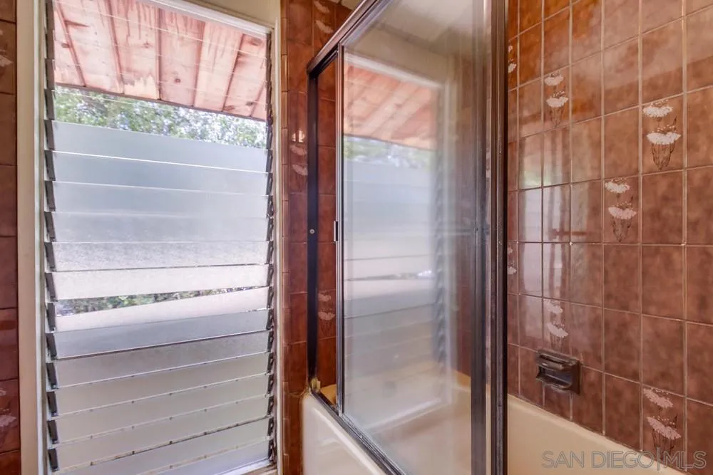 8680 Golf Drive Spring Valley, CA 91941 - Photo 31 of 70 a bathroom with a shower