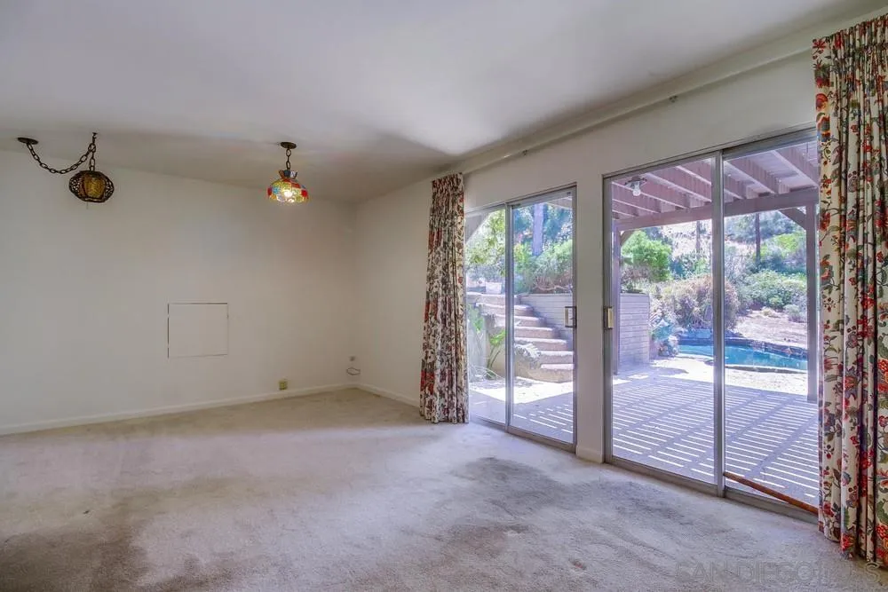 8680 Golf Drive Spring Valley, CA 91941 - Photo 33 of 70 an empty room with sliding door