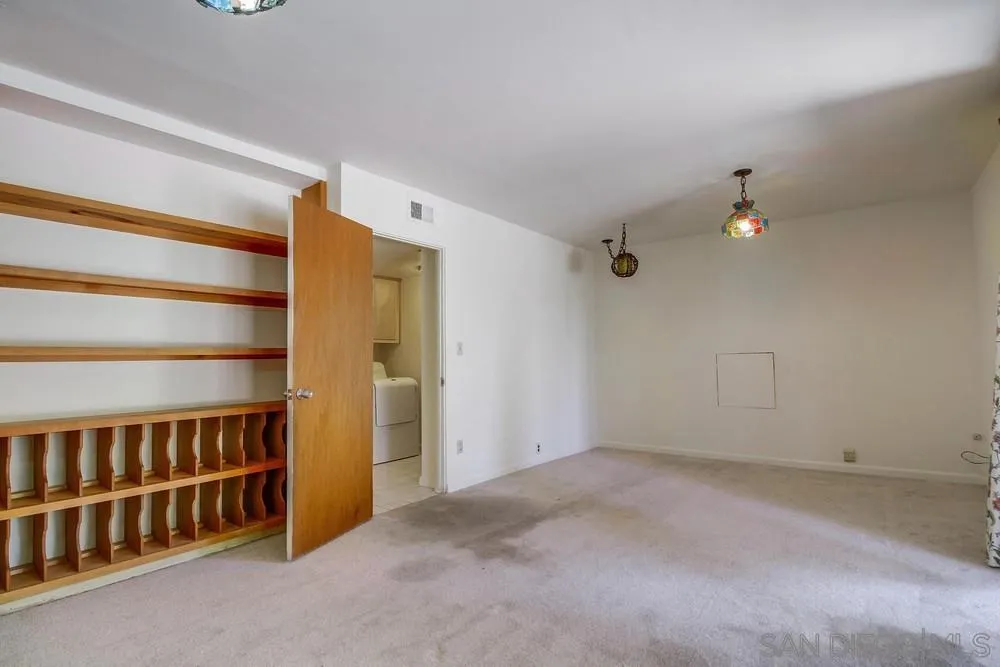 8680 Golf Drive Spring Valley, CA 91941 - Photo 36 of 70 a view of a livingroom with an empty space and a window