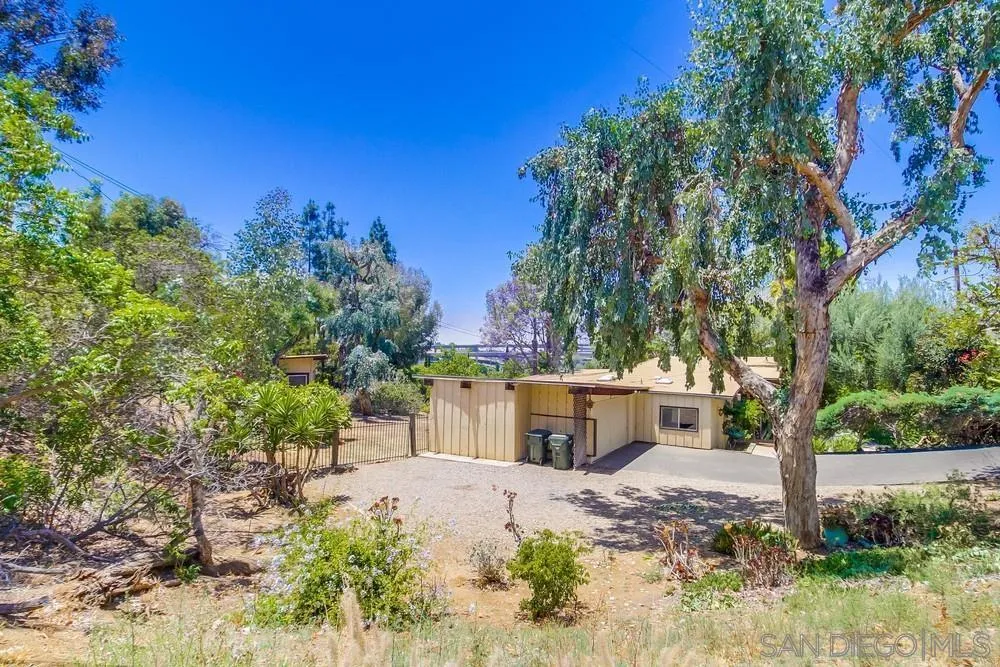 8680 Golf Drive Spring Valley, CA 91941 - Photo 37 of 70 a view of a yard with plants and trees