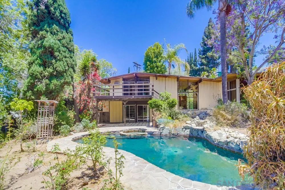 8680 Golf Drive Spring Valley, CA 91941 - Photo 52 of 70 a house with garden in front of it