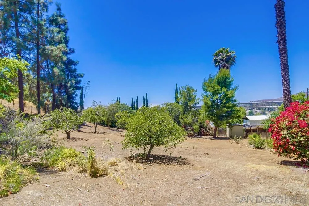 8680 Golf Drive Spring Valley, CA 91941 - Photo 60 of 70 a pathway of a house with a yard
