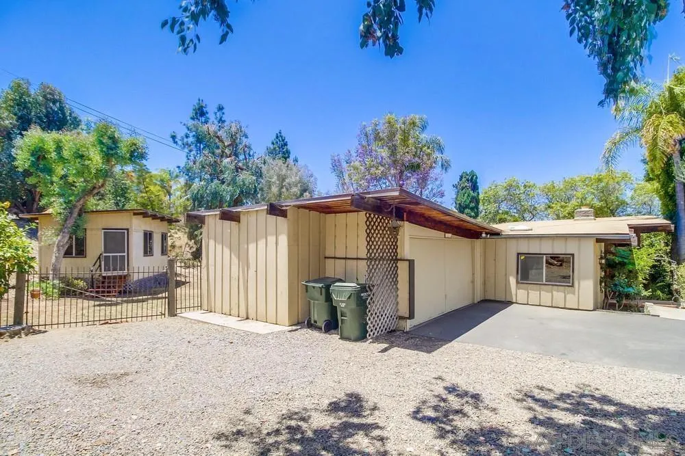 8680 Golf Drive Spring Valley, CA 91941 - Photo 67 of 70 a view of a backyard with a tree