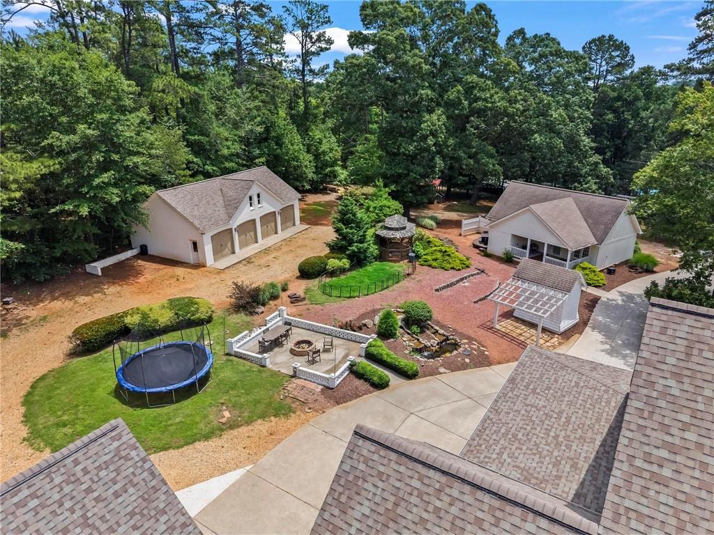 2630 Old Atlanta Road Cumming, GA 30041 - Photo 9 of 87 an aerial view of a house with garden space and street view