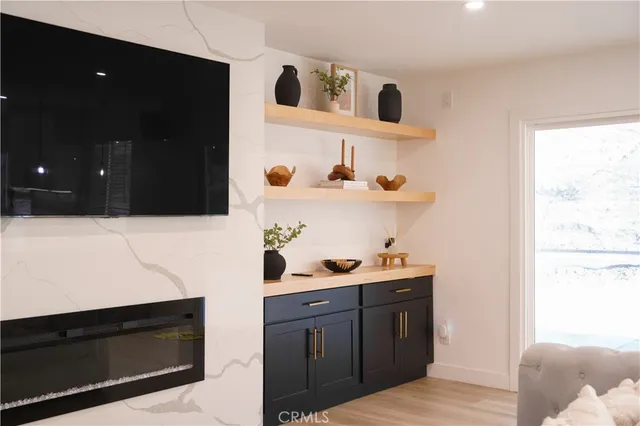 a kitchen with a table and chairs in it