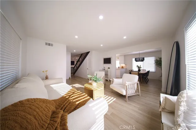 an outdoor living room with furniture