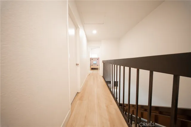 a bedroom with furniture and a fireplace
