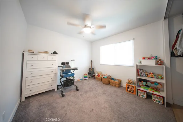a bathroom with a sink toilet vanity and a mirror