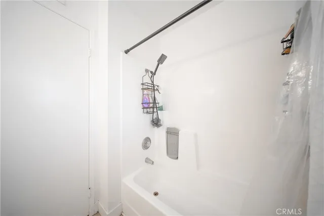 a view of a balcony with chairs