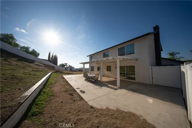 a view of a house with a patio