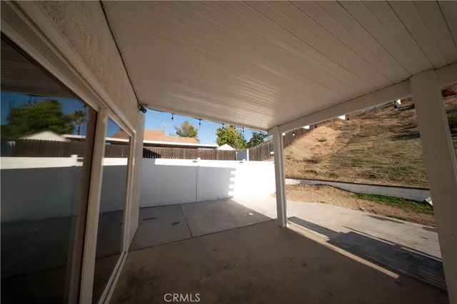 a view of a backyard of the house