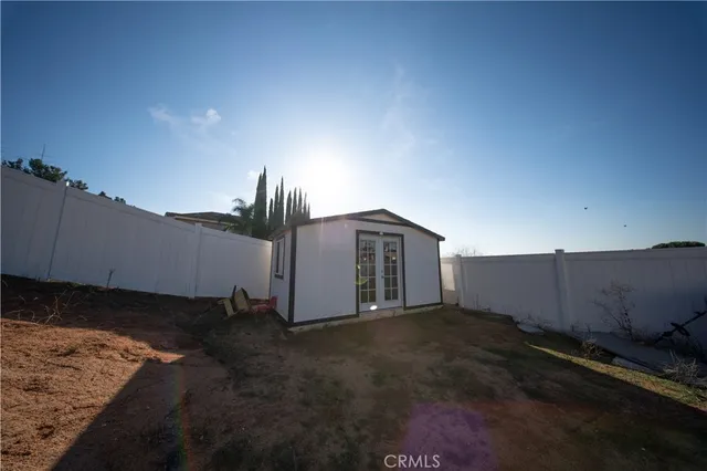 a view of a backyard of a house