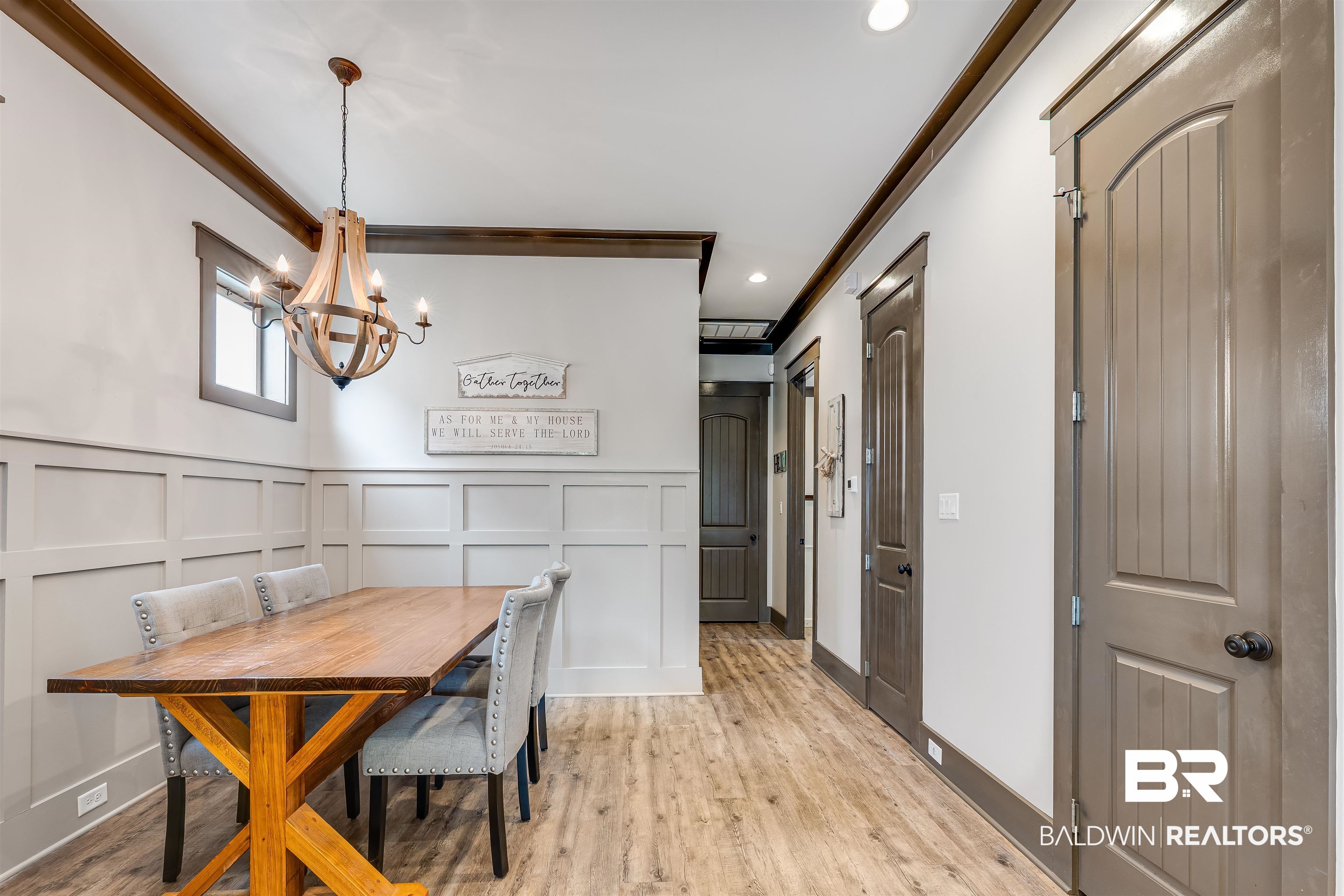 1119 Pink Poppy Lane Foley, AL 36535 - Photo 18 of 38 Dining space with a decorative wall, wood finished floors, a wainscoted wall, ornamental molding, and recessed lighting