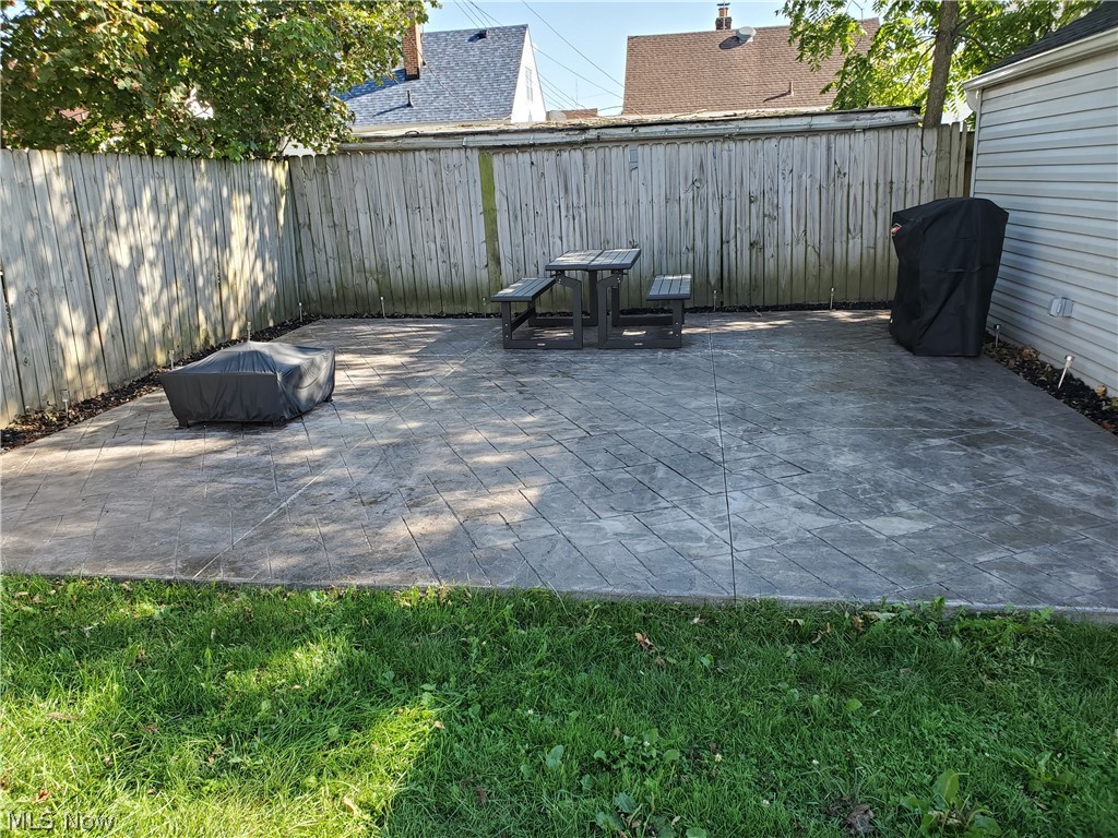 5615 Ridgewood Avenue Parma, OH 44129 - Photo 19 of 19 Beautiful stamped concrete patio in private setting.