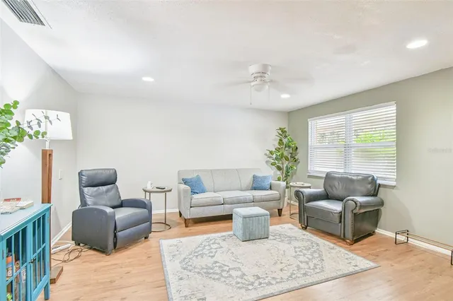 a living room with furniture and a couch