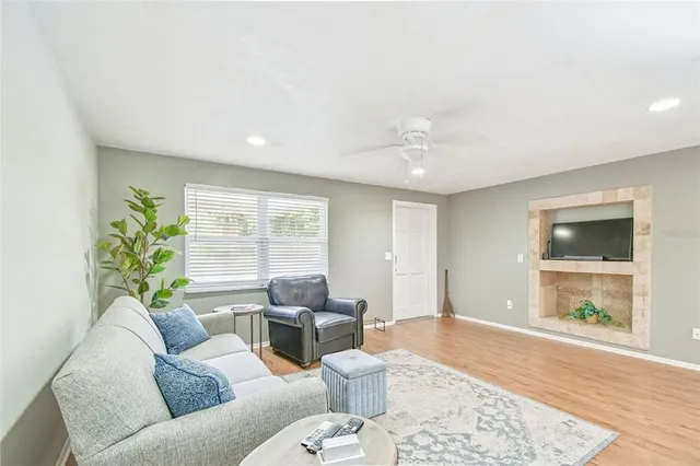 a living room with furniture and a window