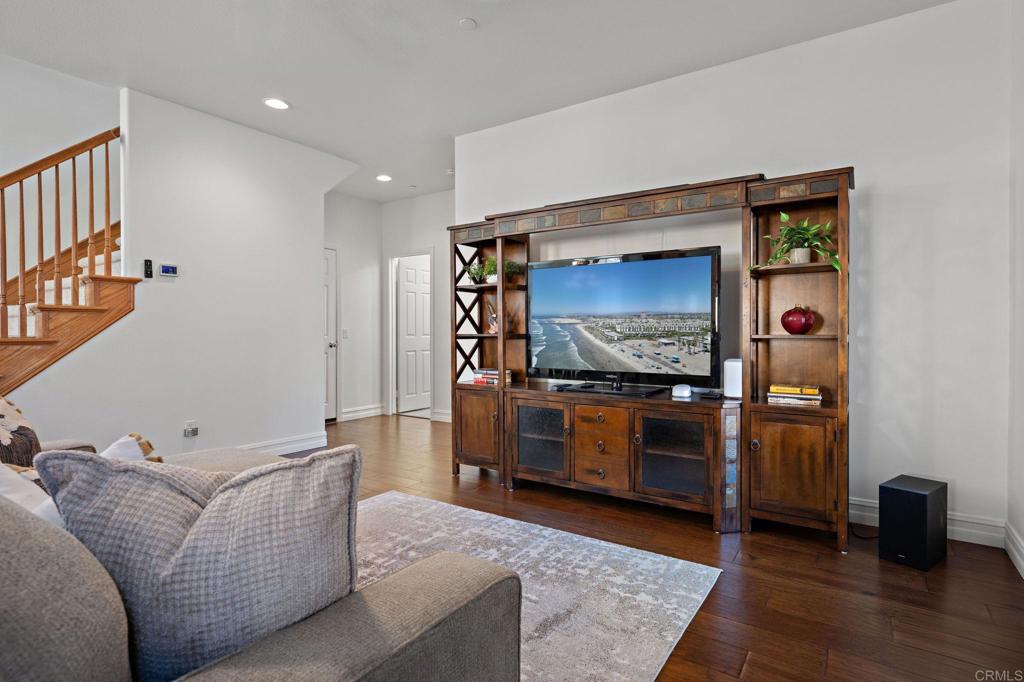 655 Dimaio Way Escondido, CA 92027 - Photo 12 of 46 a living room with furniture and a flat screen tv
