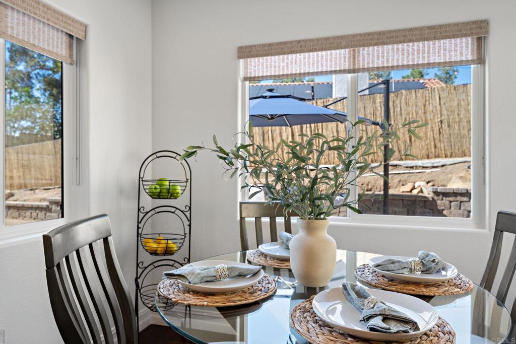 655 Dimaio Way Escondido, CA 92027 - Photo 21 of 46 a dining room with furniture and window