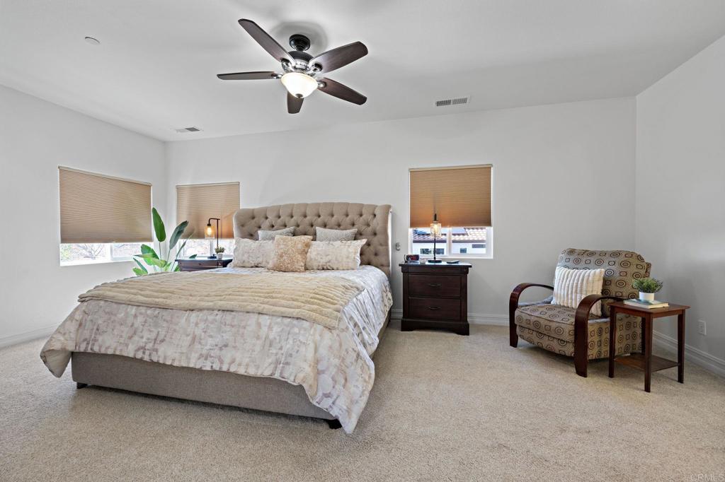 655 Dimaio Way Escondido, CA 92027 - Photo 33 of 46 a bedroom with bed and a window