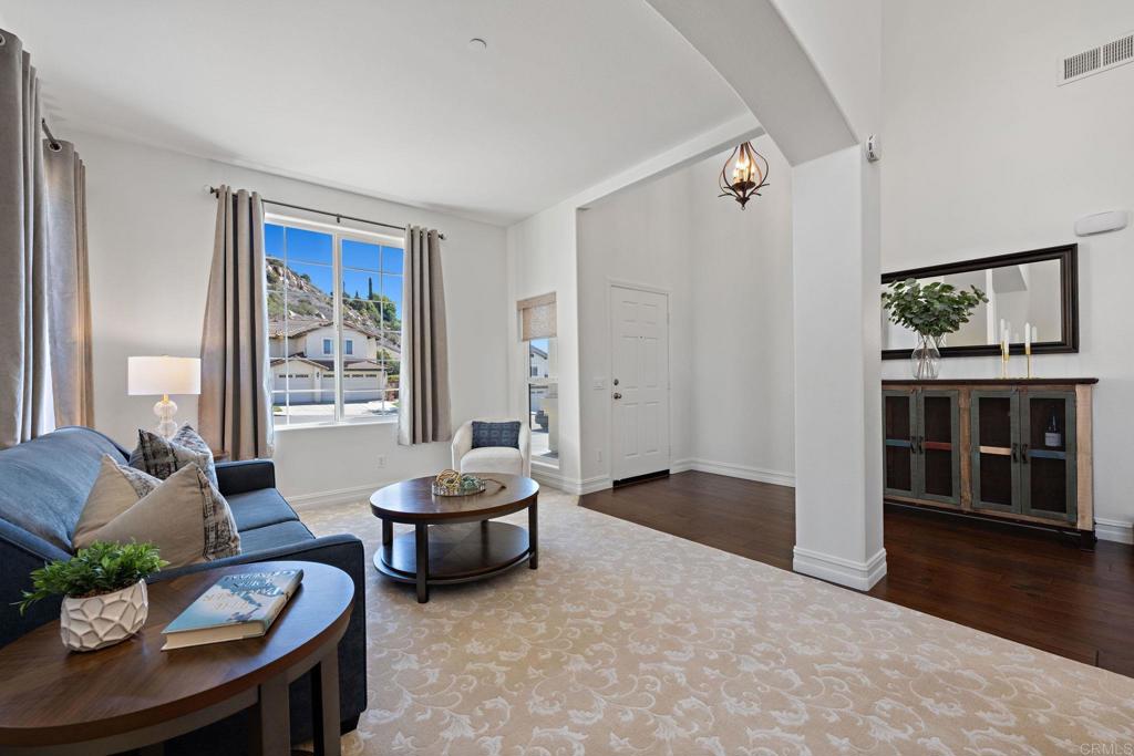 655 Dimaio Way Escondido, CA 92027 - Photo 6 of 46 a living room with furniture and window