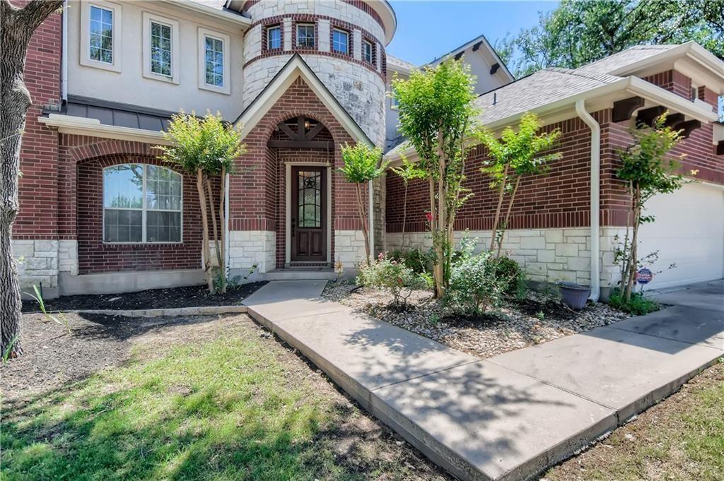 3822 Remington Road Cedar Park, TX 78613 - Photo 2 of 31 a front view of a house with garden