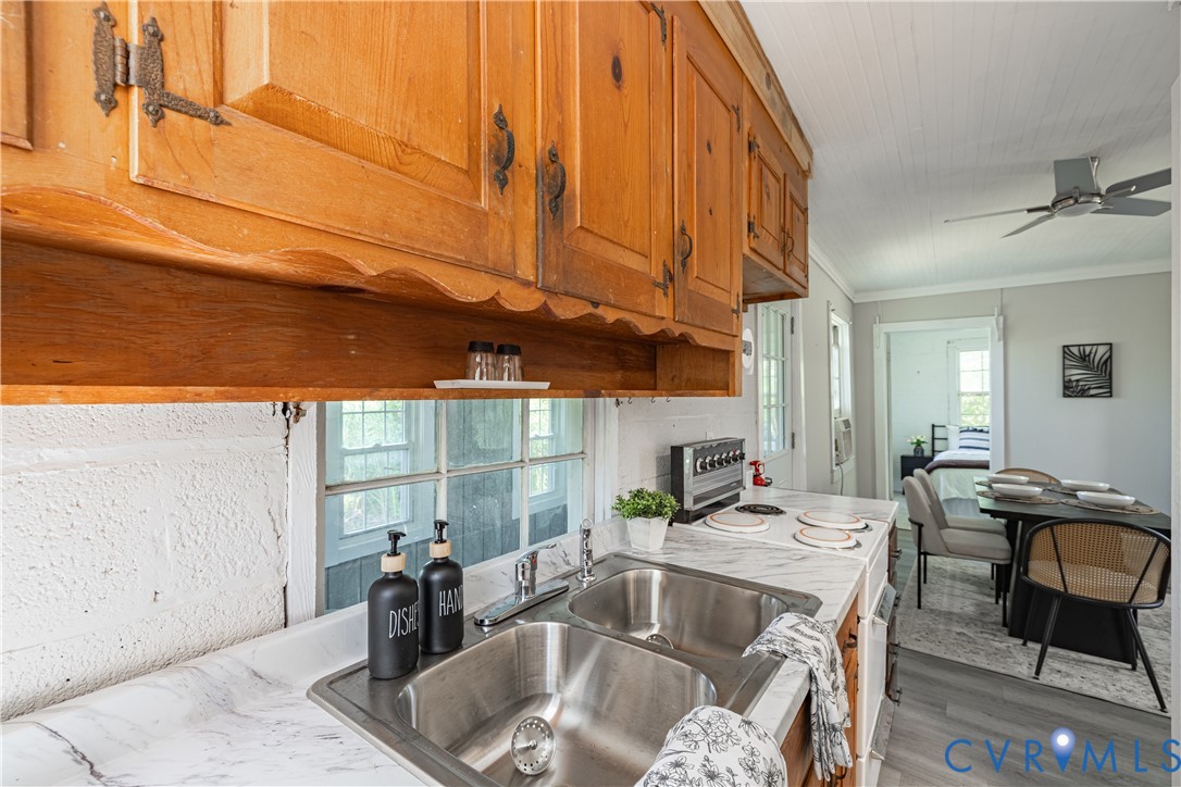 933 Pleasant Point Road Surry, VA 23883 - Photo 12 of 45 a kitchen view with table and chairs