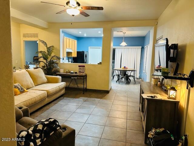 9558 West Monte Vista Road Phoenix, AZ 85037 - Photo 2 of 14 living room
