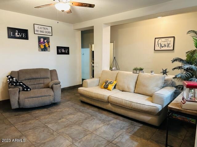 9558 West Monte Vista Road Phoenix, AZ 85037 - Photo 3 of 14 Living room 1