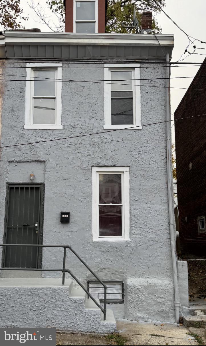 269 East Sharpnack Street Philadelphia, PA 19119 - Photo 1 of 9 Charming gray facade with inviting steps.